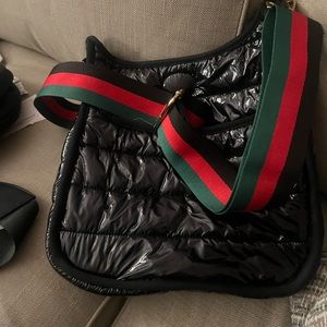 AH-dorned sporty patented black crossbody